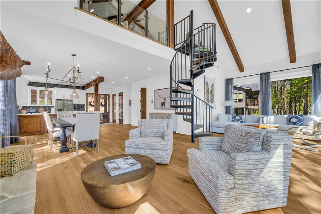 1132 Edgewater Trail Toccoa, GA 30577 - Photo 36 of 51 a living room with furniture and wooden floor