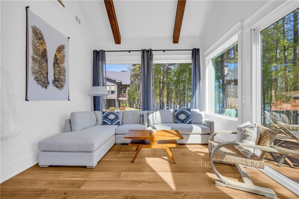 1132 Edgewater Trail Toccoa, GA 30577 - Photo 37 of 51 a living room with furniture and large windows