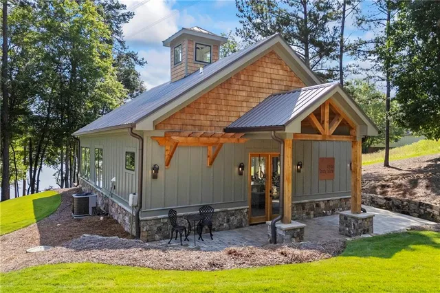a front view of house with yard and seating area