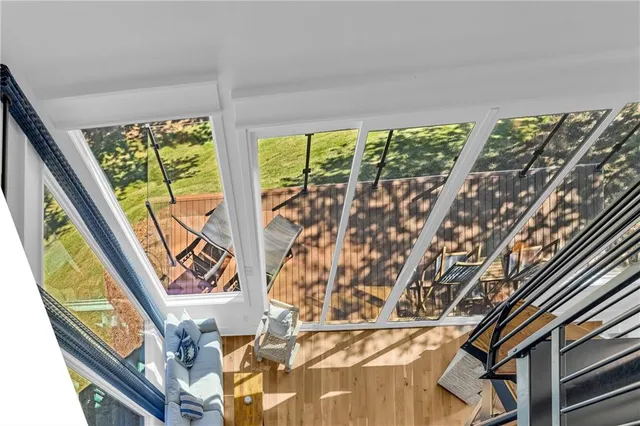 a bathroom with a shower and toilet