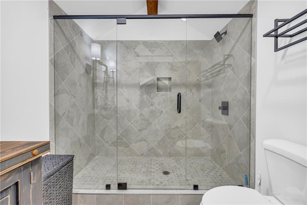 1132 Edgewater Trail Toccoa, GA 30577 - Photo 47 of 51 a bathroom with a shower and toilet