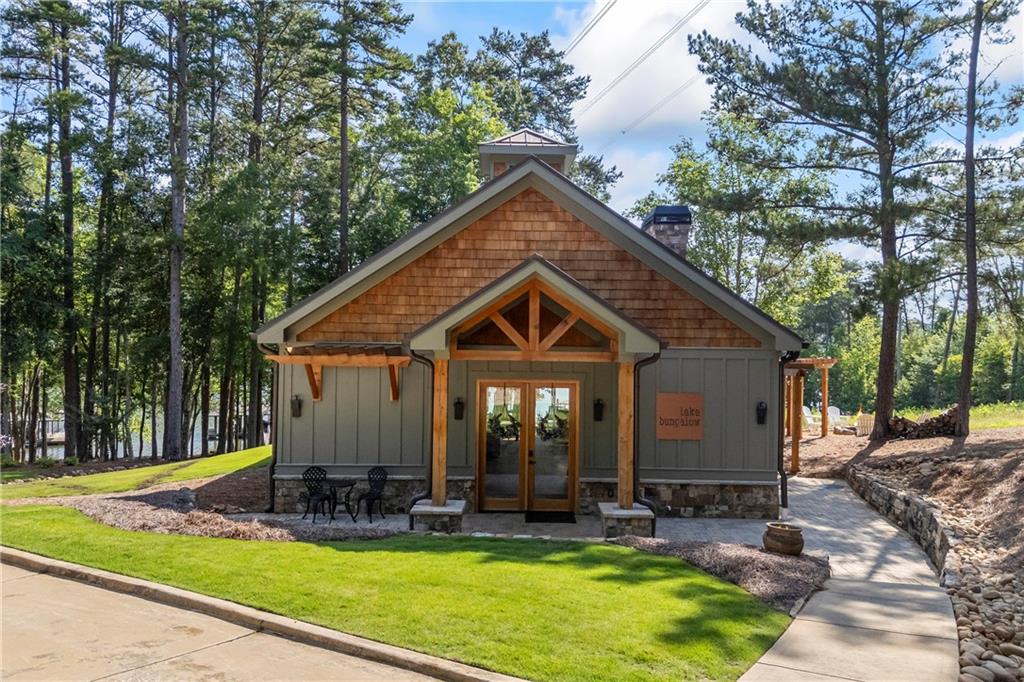 1132 Edgewater Trail Toccoa, GA 30577 - Photo 5 of 51 a view of a house with backyard and sitting area