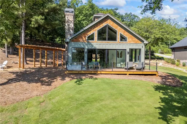 a front view of a house with swimming pool