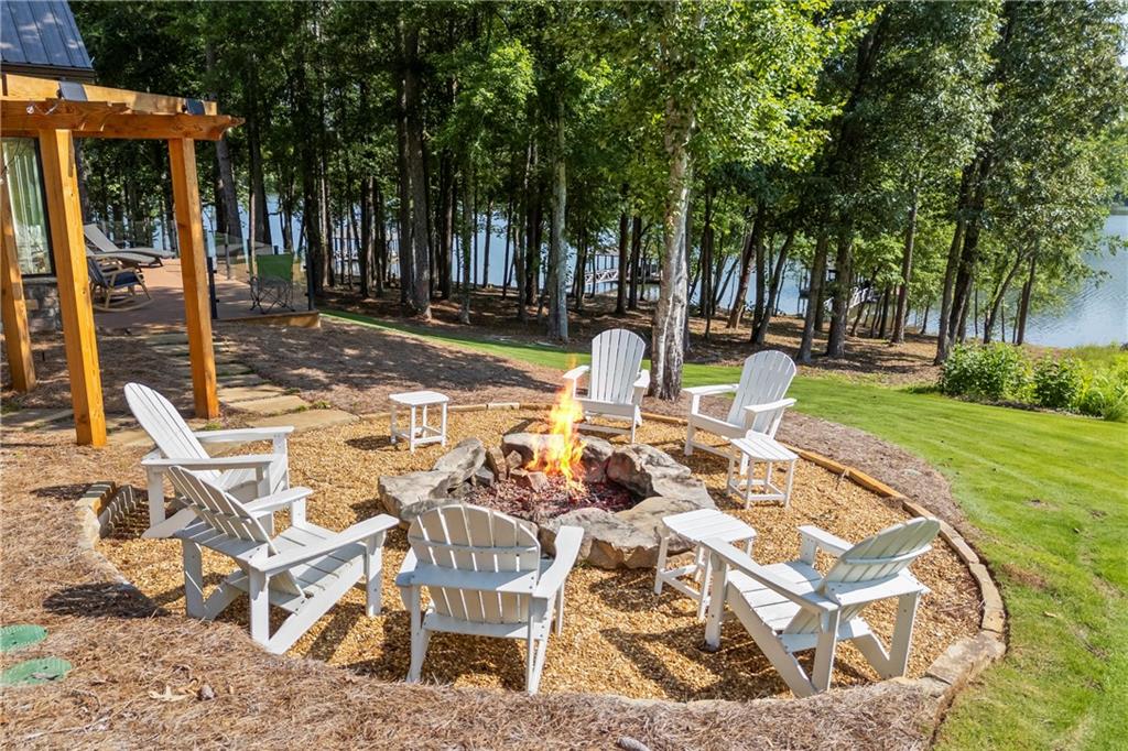 1132 Edgewater Trail Toccoa, GA 30577 - Photo 9 of 51 a view of a swimming pool with a patio