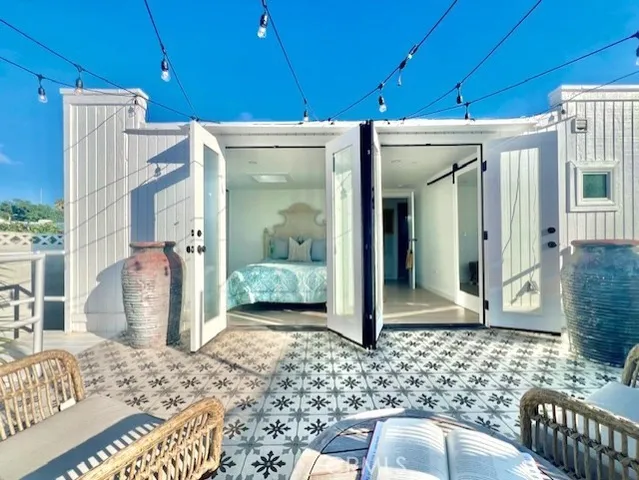 a view of a house with a lounge chair