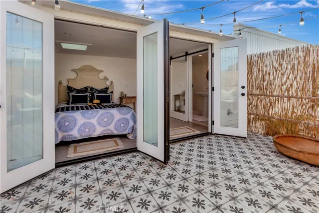 a living room with a couch and a rug