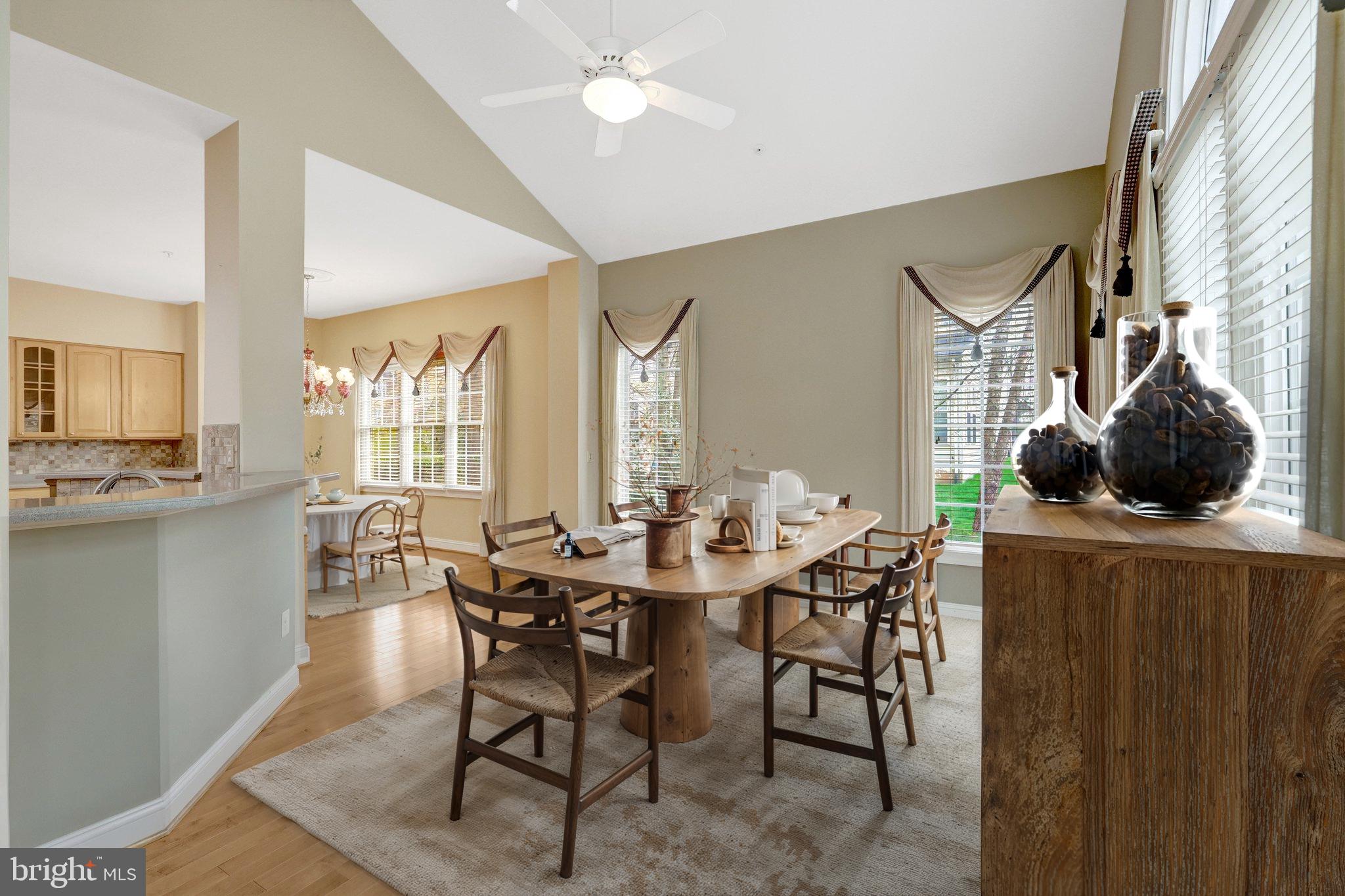 20443 Cliftons Point Street Sterling, VA 20165 - Photo 27 of 37 a view of a dining room with furniture and wooden floor