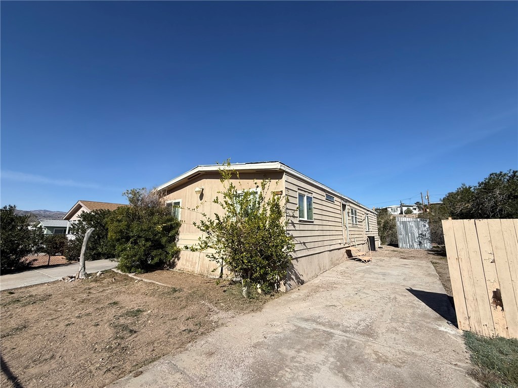 1629 Ramar Road Bullhead City, AZ 86442 - Photo 2 of 29 View of side of home