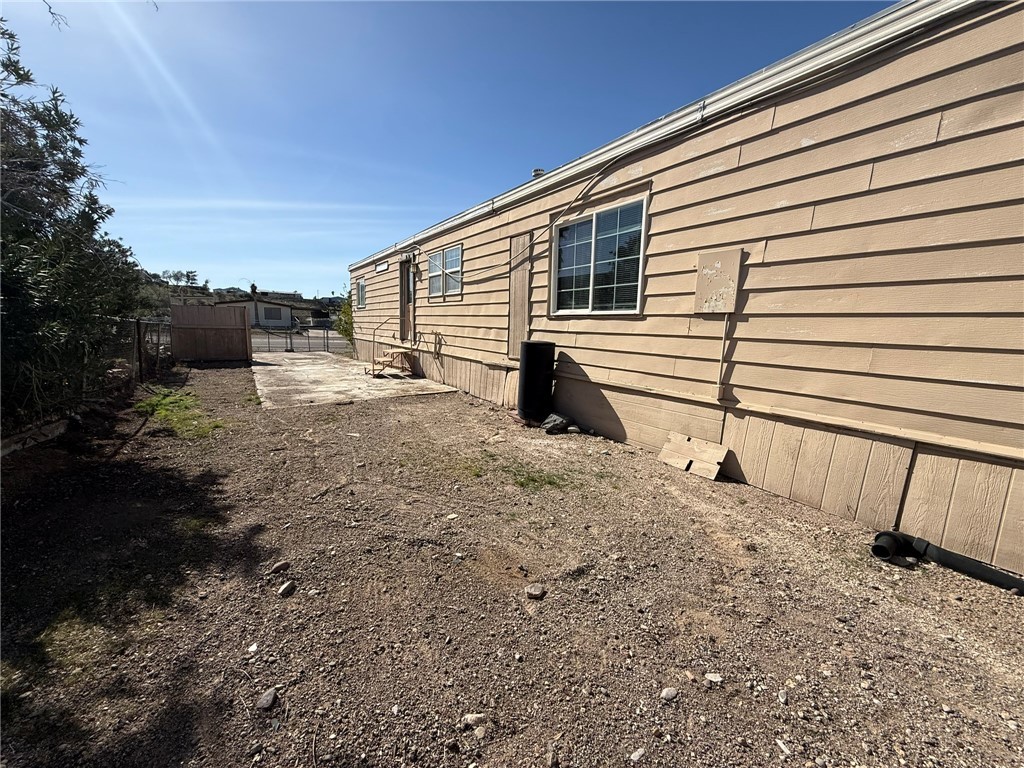 1629 Ramar Road Bullhead City, AZ 86442 - Photo 8 of 29 View of side of home