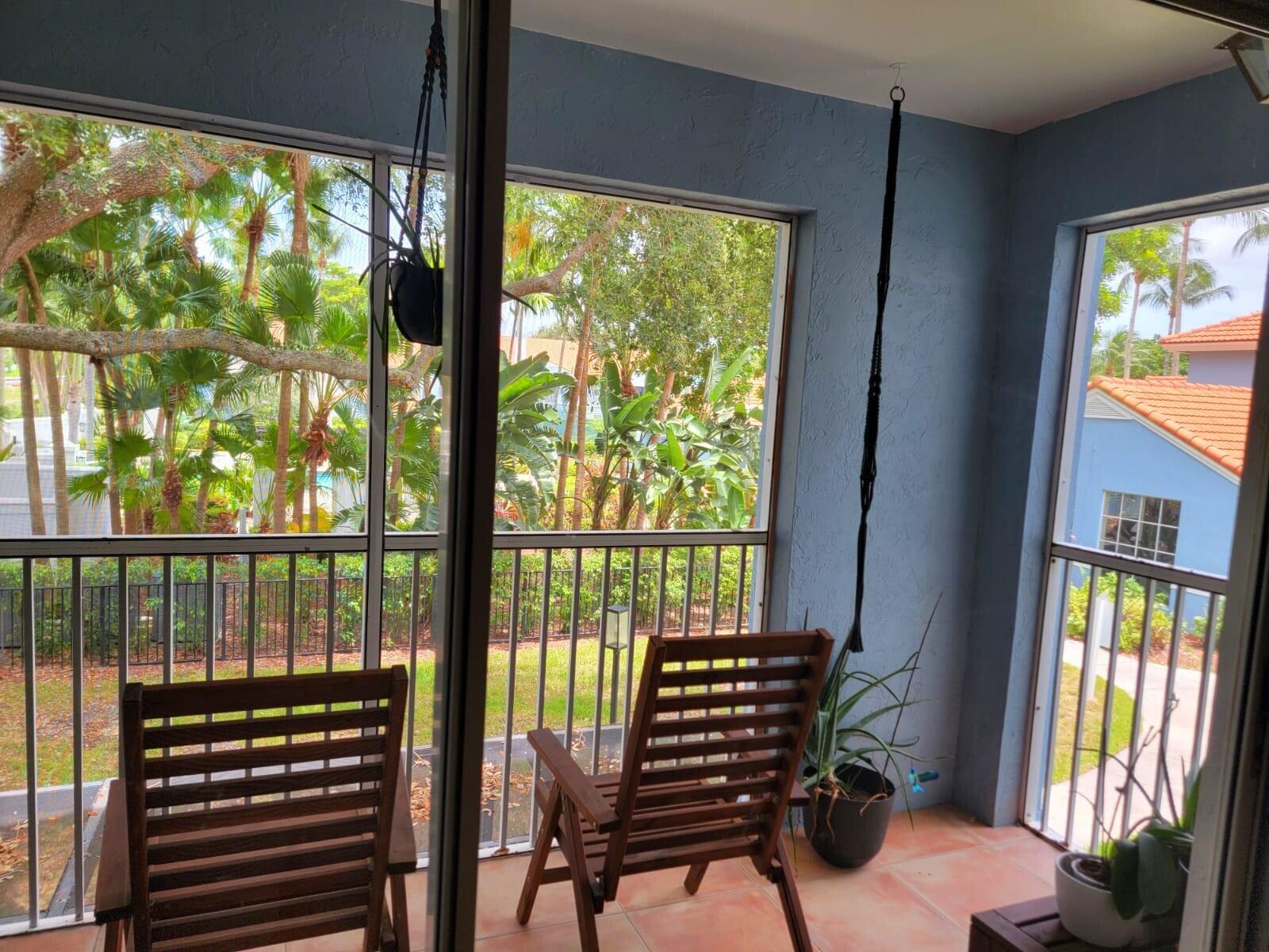 3209 Clint Moore Road, Unit 202 Boca Raton, FL 33496 - Photo 8 of 24 a view of a city from a balcony