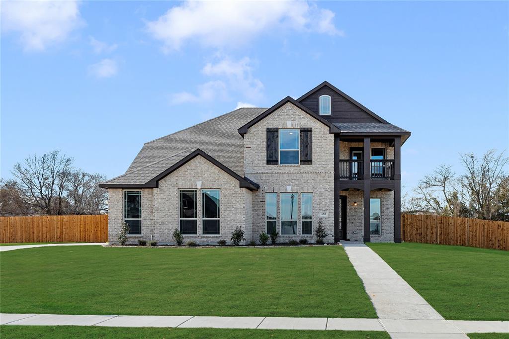 683 Crystal Lk Lane Red Oak, TX 75154 - Photo 2 of 39 a front view of a house with a yard