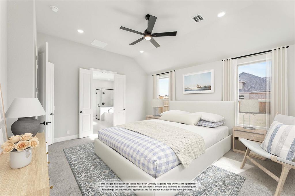 683 Crystal Lk Lane Red Oak, TX 75154 - Photo 21 of 39 a bedroom with a bed and wooden floor