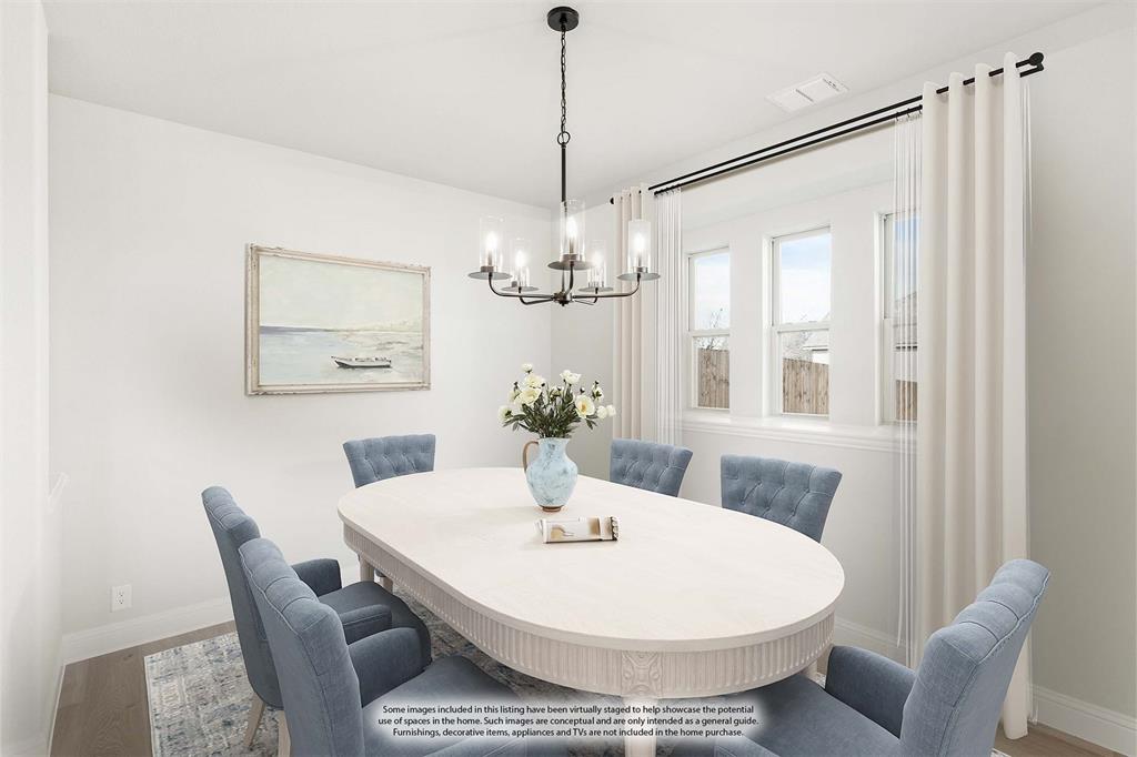 683 Crystal Lk Lane Red Oak, TX 75154 - Photo 8 of 39 a view of a dining room with furniture and chandelier