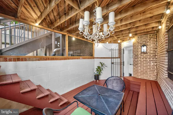a backyard of a house with seating space