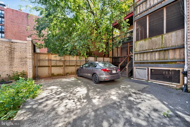 a view of a street with cars