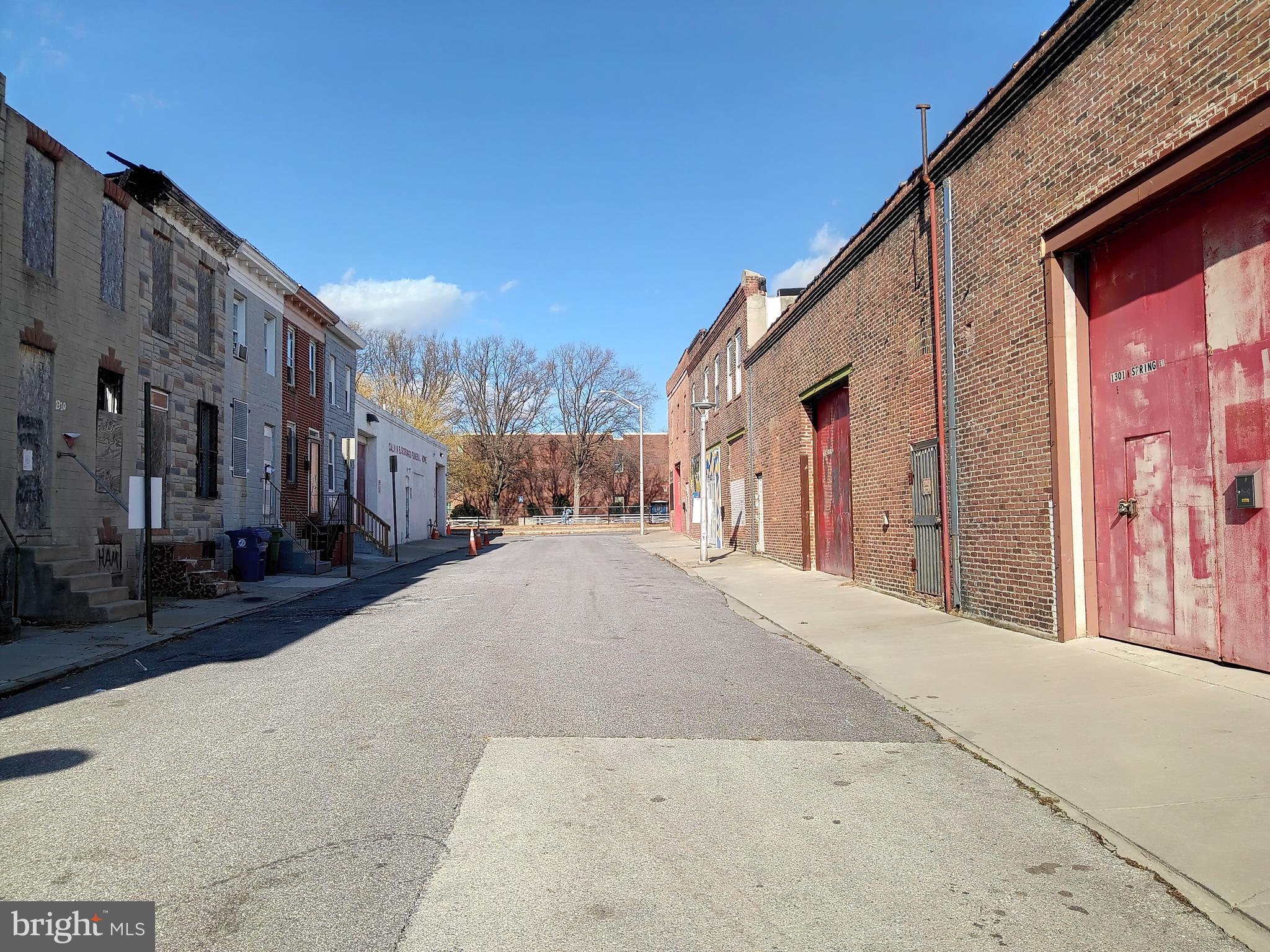 1302 North Spring Street Baltimore, MD 21213 - Photo 11 of 11 a view of a street with a building
