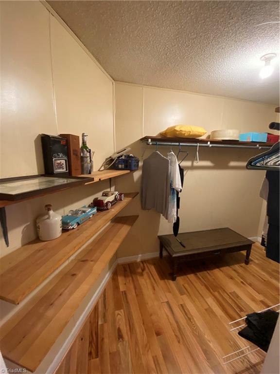 331 Collins Road Dobson, NC 27017 - Photo 13 of 50 walk in closet in primary