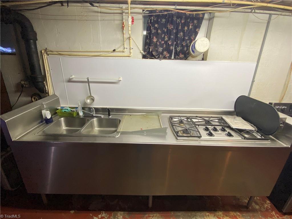 331 Collins Road Dobson, NC 27017 - Photo 48 of 50 Gas stove in basement