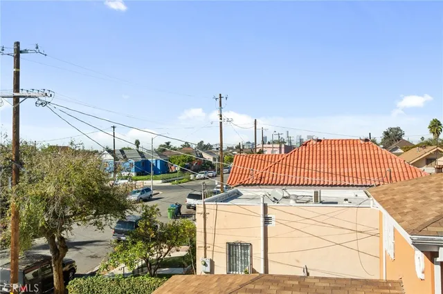 a view of a street with a building in the background