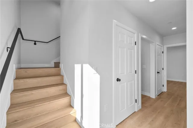 a view of staircase with white walls and white walls