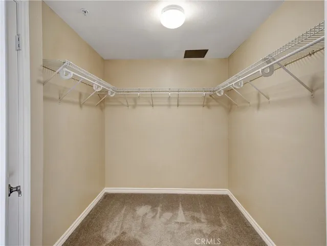 a view of a room with racks on the wall