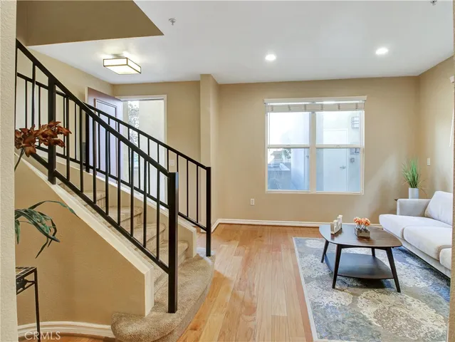 a view of livingroom with furniture and stairs