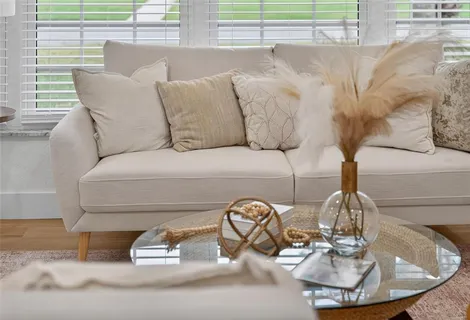 a kitchen with stainless steel appliances a sink and a refrigerator