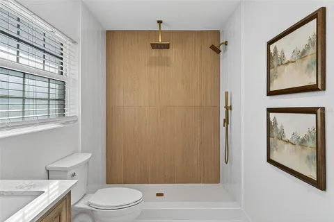 a view of a city with mountains in the background