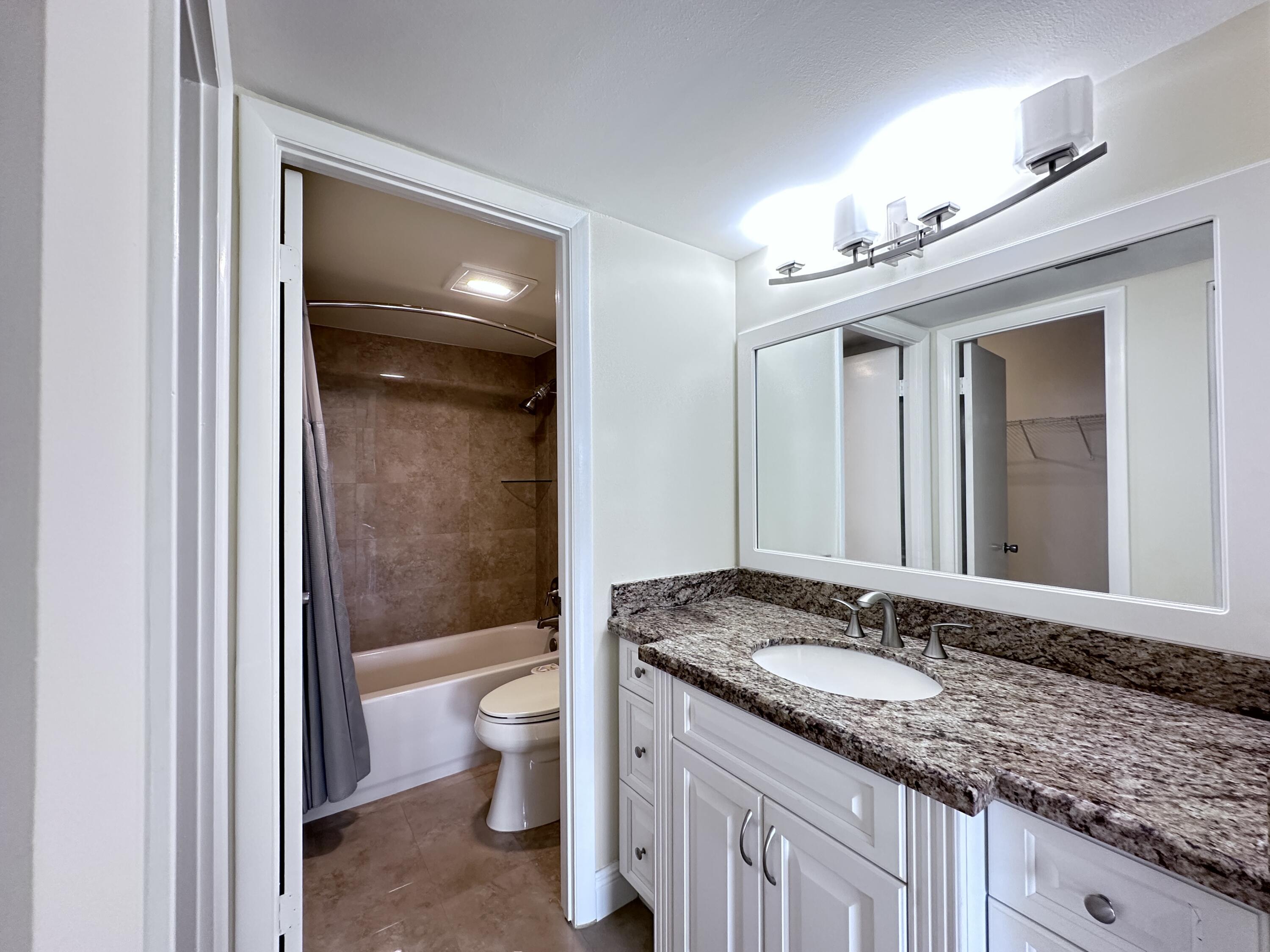 10777 West Sample Road, Unit 714 Coral Springs, FL 33065 - Photo 9 of 19 Master bathroom 2