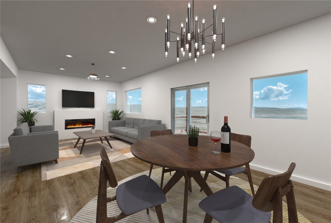 344 Redhill Road Fairplay, CO 80440 - Photo 15 of 34 a view of a dining room with furniture window and wooden floor