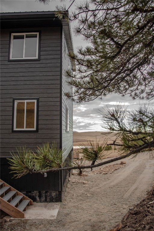 344 Redhill Road Fairplay, CO 80440 - Photo 5 of 34 a front view of a house with a yard