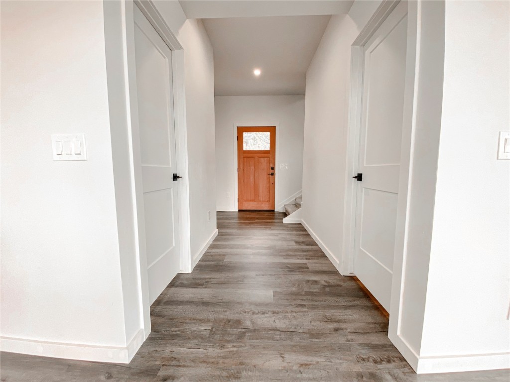 344 Redhill Road Fairplay, CO 80440 - Photo 6 of 34 a view of a hallway with wooden floor and entryway