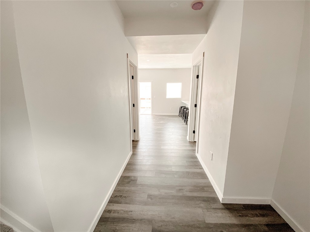 344 Redhill Road Fairplay, CO 80440 - Photo 8 of 34 a view of a hallway with wooden floor