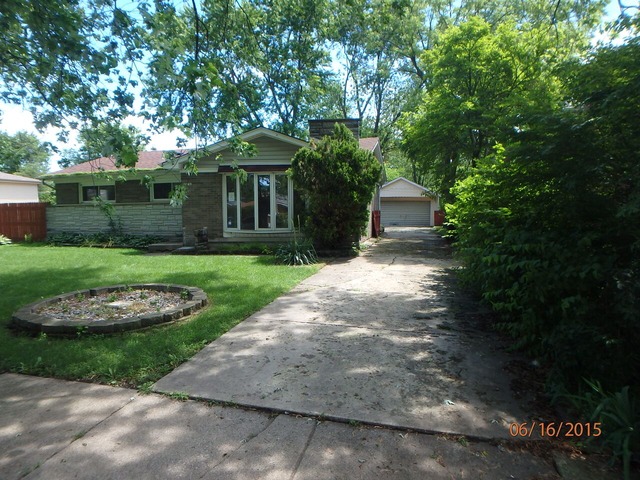 15231 Millard Avenue Midlothian, IL 60445 - Photo 1 of 15 a front view of a house with garden