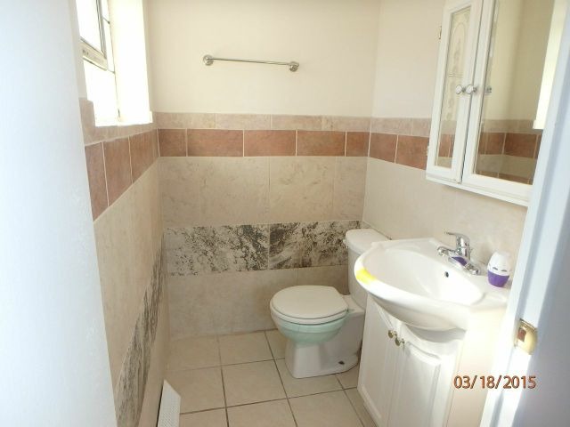 15231 Millard Avenue Midlothian, IL 60445 - Photo 11 of 15 a bathroom with a sink toilet and shower