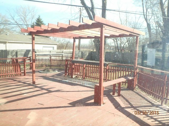 15231 Millard Avenue Midlothian, IL 60445 - Photo 13 of 15 a view of a balcony with wooden floor