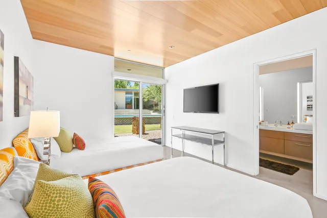 a bathroom with a shower and a toilet