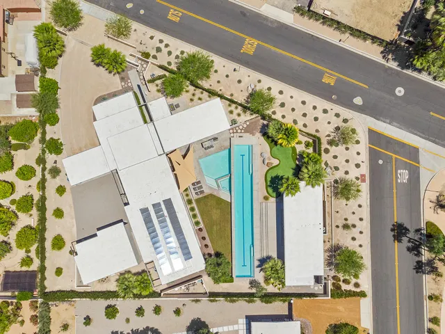 front view of a house with a potted plant
