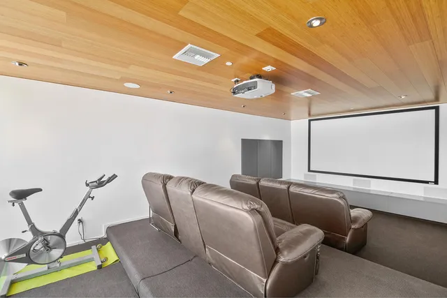 a kitchen with a sink and a large window