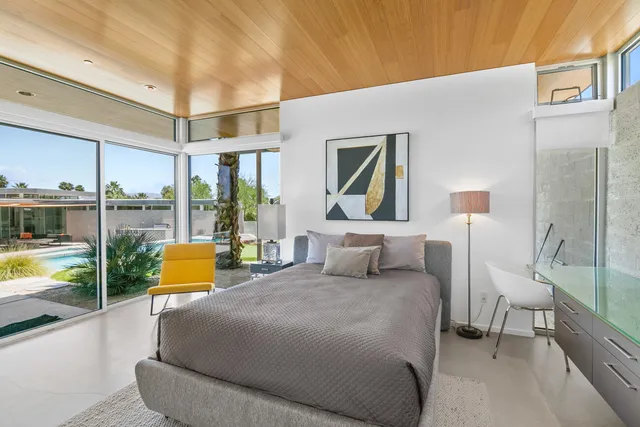 a view of a swimming pool with a patio