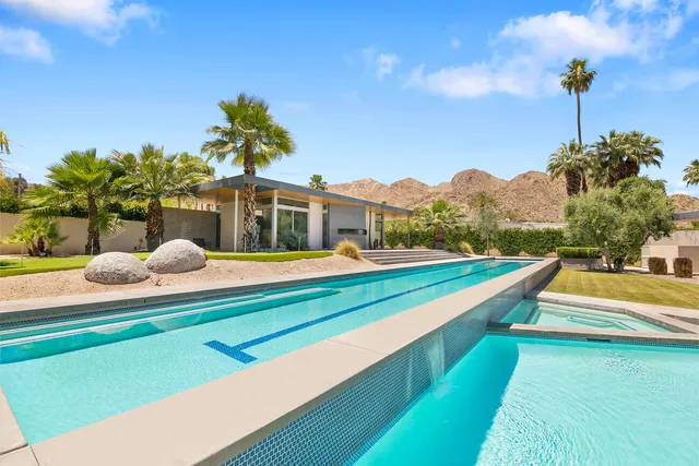 a view of balcony with furniture