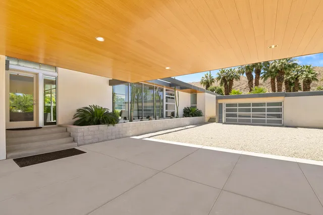 a outdoor living space with furniture and a couch