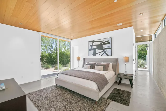 a bathroom with a sink double vanity and a mirror