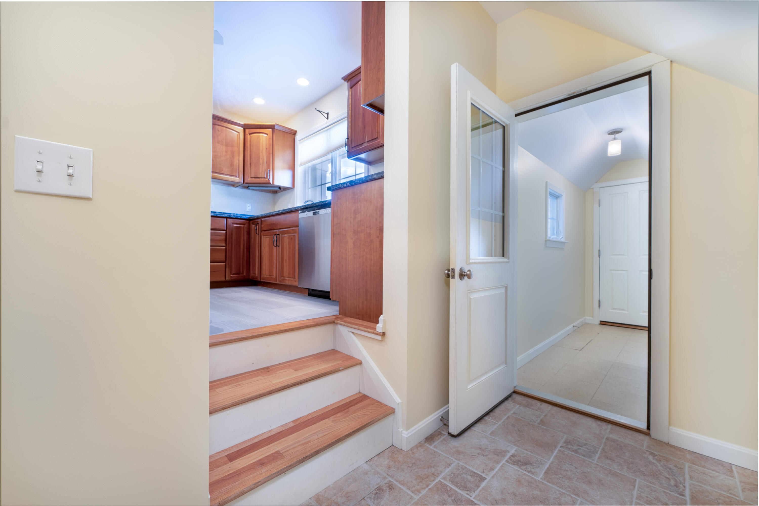 4 Iris Way, Unit 50 Brunswick, ME 04011 - Photo 28 of 32 Enclosed Breezeway Entry to Kitchen