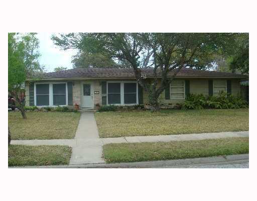 324 Pasadena Place Corpus Christi, TX 78411 - Photo 1 of 1 a front view of a house with a yard