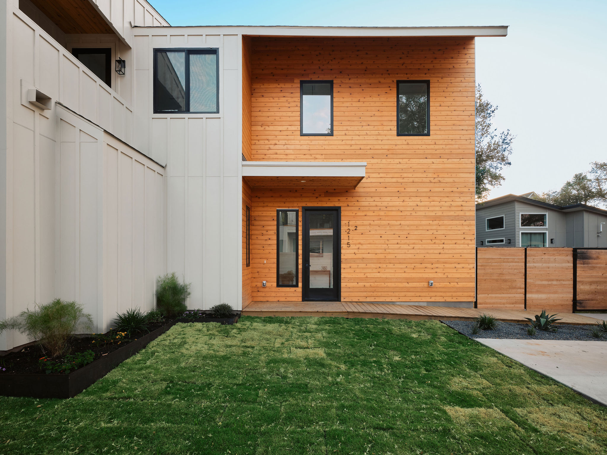 1215 Fort Branch Boulevard, Unit 2 Austin, TX 78721 - Photo 23 of 23 a front view of a house with garden