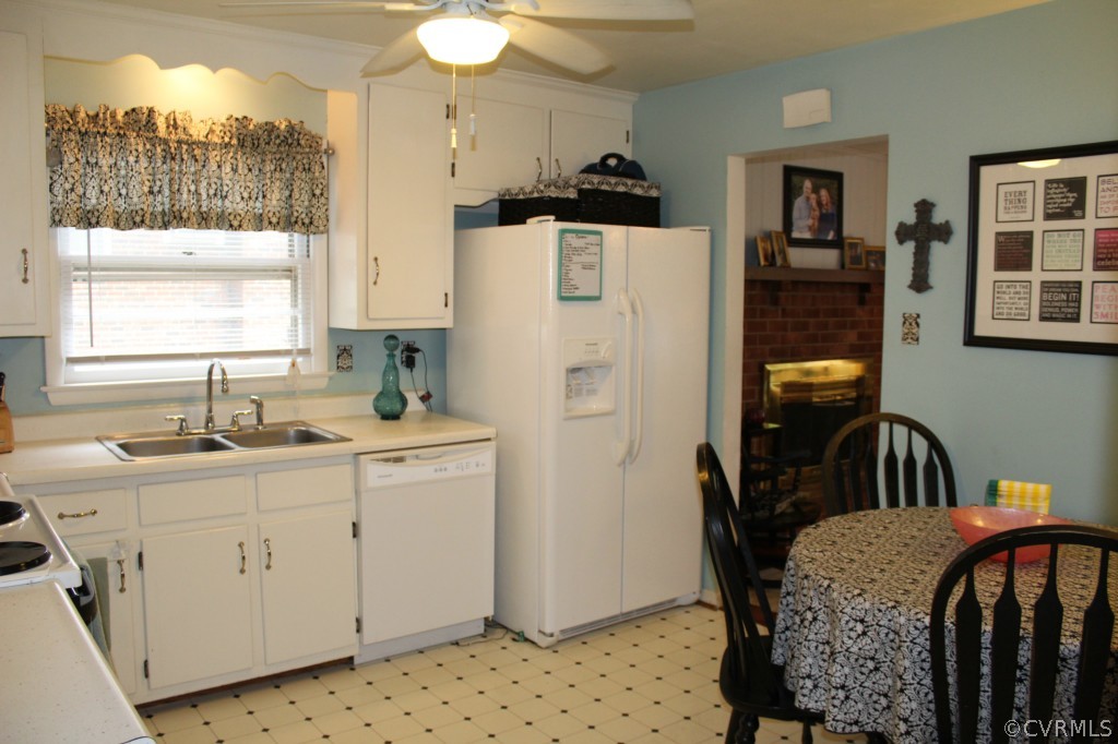 2406 Rio Vista Street Chester, VA 23831 - Photo 7 of 20 a kitchen with a refrigerator and a sink