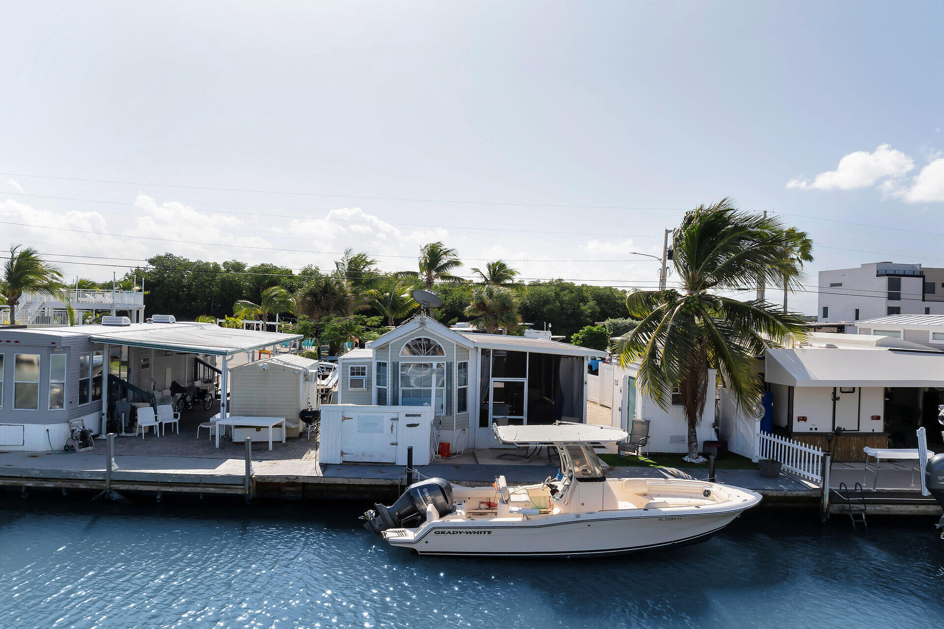 325 Calusa Street, Unit 213 Key Largo, FL 33037 - Photo 1 of 60 Concrete dock
