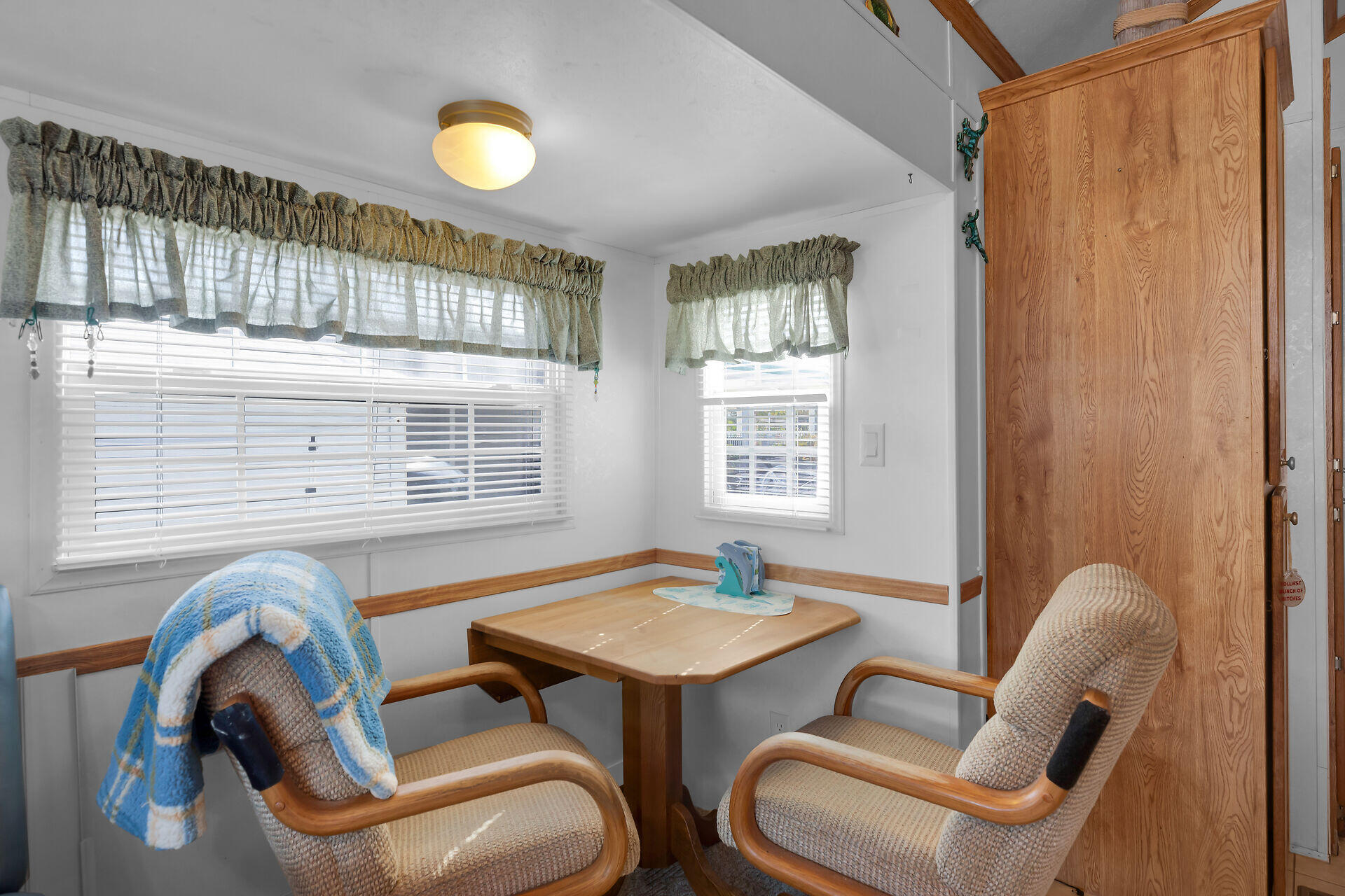 325 Calusa Street, Unit 213 Key Largo, FL 33037 - Photo 14 of 60 a dining room with furniture and window