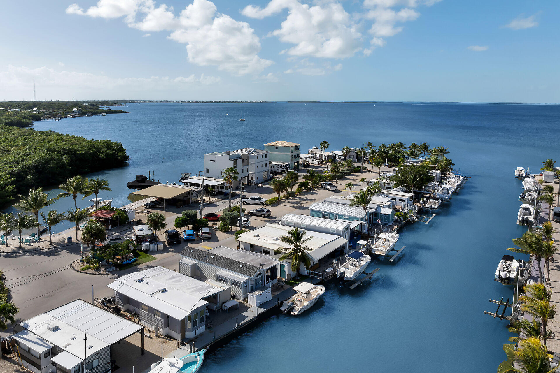 325 Calusa Street, Unit 213 Key Largo, FL 33037 - Photo 26 of 60 an aerial view of a house with parking space
